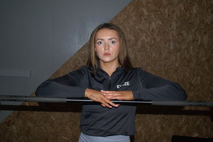 Women’s Evaze Performance 1/4 Zip in Charcoal.